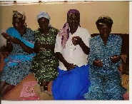 widows making necklaces_1.jpg